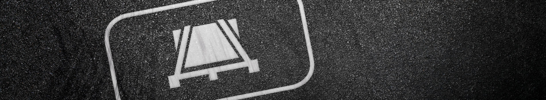 vam Jadeweser Piktogramm Ladungssicherung auf Asphalt.